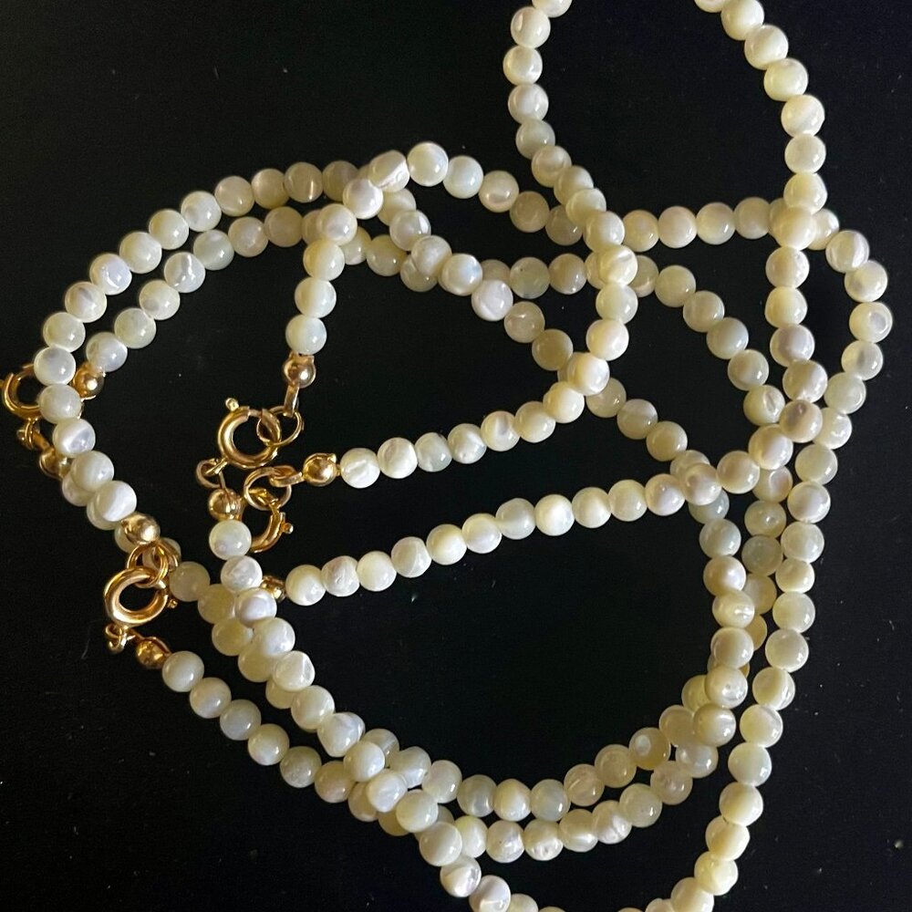 Strands of Mother -of -Pearl Beads , About 2 MM and clasped